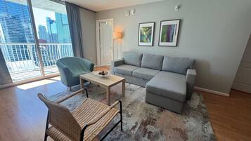 Condo, 2 Bedrooms, City View | Living area | 50-inch flat-screen TV with digital channels