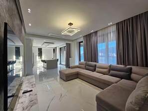 Apartament familiar, vistes a la ciutat | Sala d'estar
