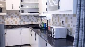 Honeymoon Apartment | Private kitchen | Coffee/tea maker, electric kettle, dining tables