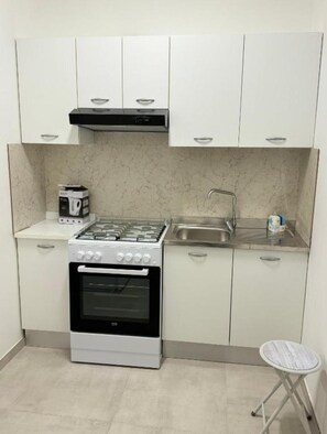 Quarto casal conforto | Cozinha privada