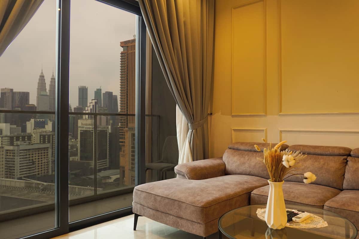 Premium Two-Bedroom Apartment with balcony | Living area | 43-inch Smart TV with digital channels, Netflix, streaming services
