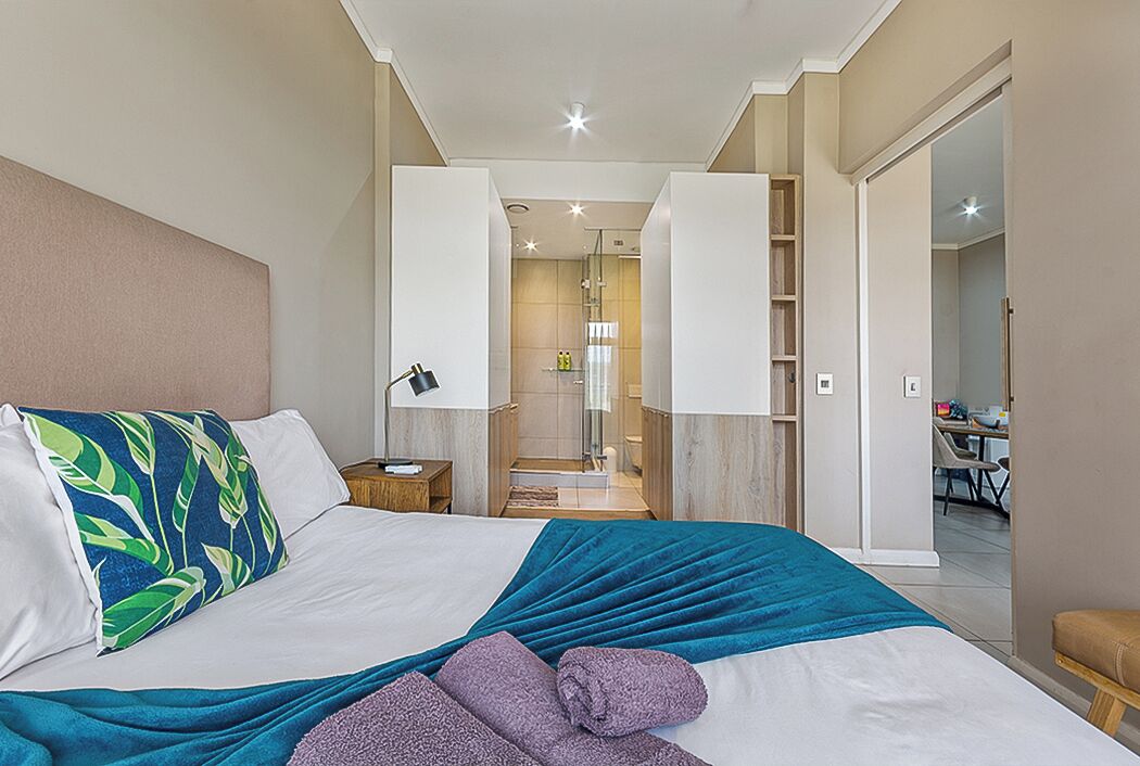 1 dormitorio, tabla de planchar con plancha, wifi y ropa de cama