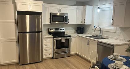 Modern 2-Bedroom Apartment in a Quiet Suburb;Close to Shops, Banks, and Airport!