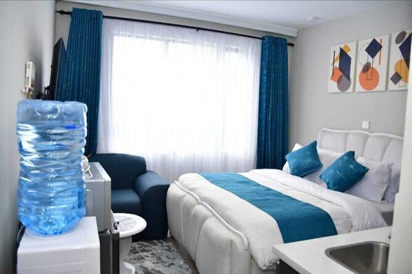 1 habitación, tabla de planchar con plancha y wifi 