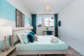 1 bedroom, desk, iron/ironing board, travel crib