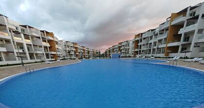 Light & Airy Family apartment with private pools & excellent local beaches