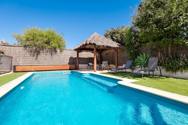 Unwind and lounge by the refreshing saltwater pool
