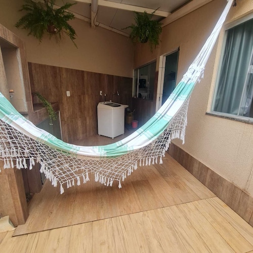 Cozy room with suite in a house in Setor Goiânia 2, Goiânia for families.