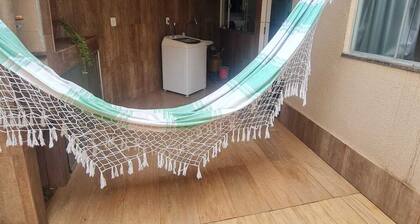 Cozy room with suite in a house in Setor Goiânia 2, Goiânia for families.