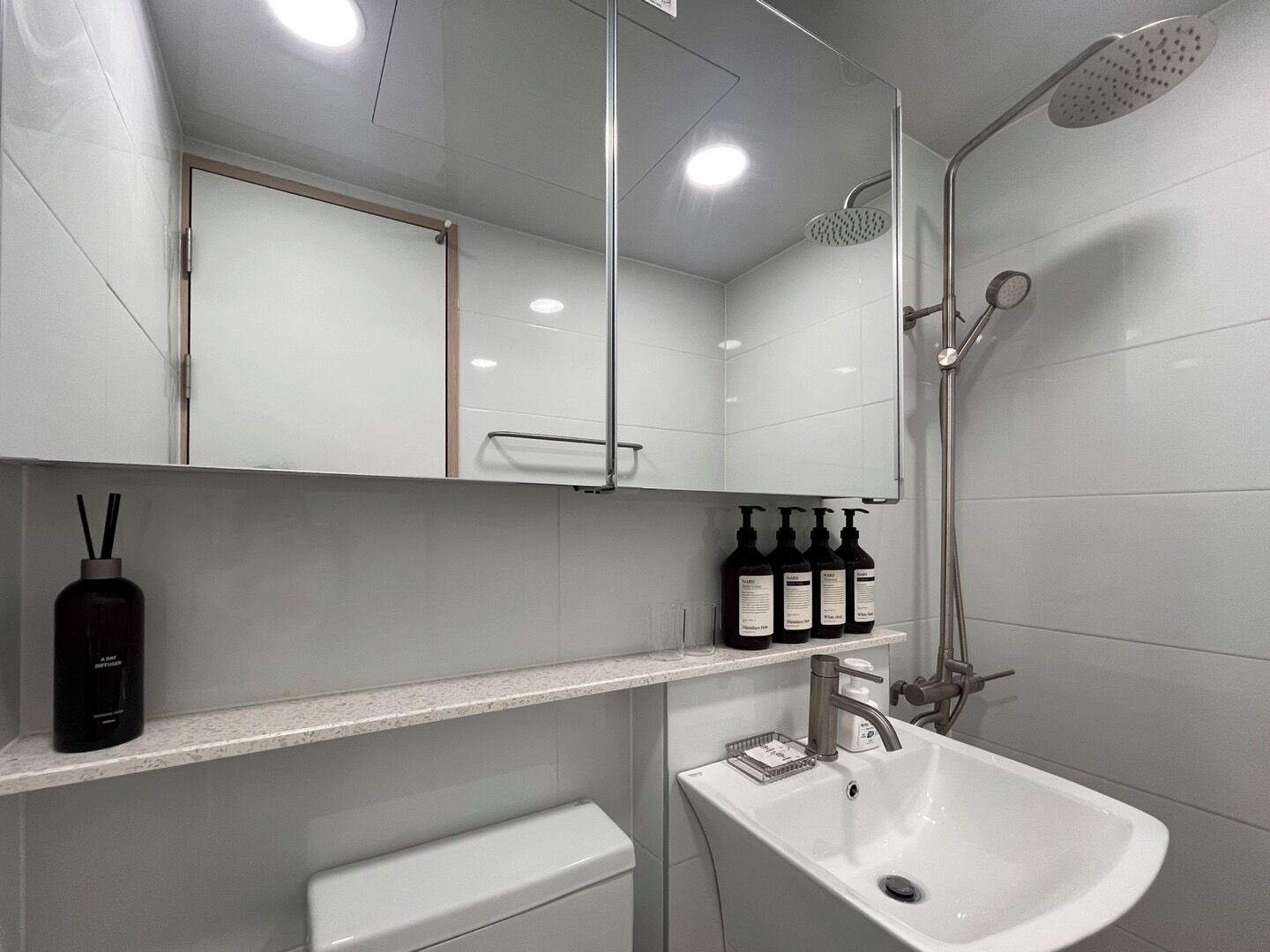Shower, free toiletries, hair dryer, slippers