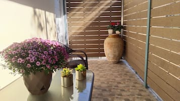 Familie appartement, uitzicht op de binnenplaats | Terras