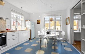 Fridge, dishwasher, coffee/tea maker, cookware/dishes/utensils