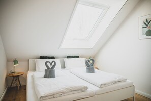 2 habitaciones, tabla de planchar con plancha, wifi y ropa de cama 
