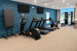 A gym with treadmills, elliptical machines, and a weight machine. - La Quinta Inn & Suites by Wyndham Shonto (Shonto)