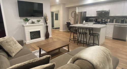 Classy and modern, 2 bedroom suite covered with patio.