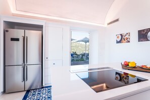 Luxury Villa | Private kitchen | Fridge, microwave, oven, stovetop