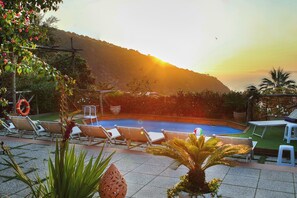 Outdoor pool, pool umbrellas, pool loungers