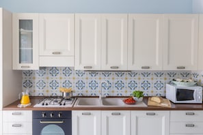 Apartment | Private kitchen | Full-size fridge, oven, stovetop, dishwasher