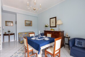 Apartment | Living area | Flat-screen TV, pay movies