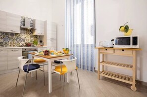 Apartamento | 2 quartos, cofres nos quartos, ferros/tábuas de passar roupa
