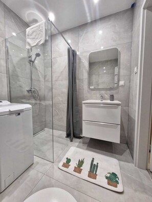 Hair dryer, towels, soap, toilet paper