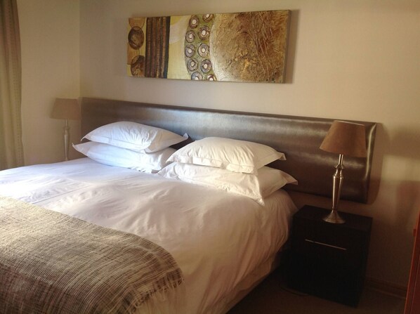 2 habitaciones, tabla de planchar con plancha y internet