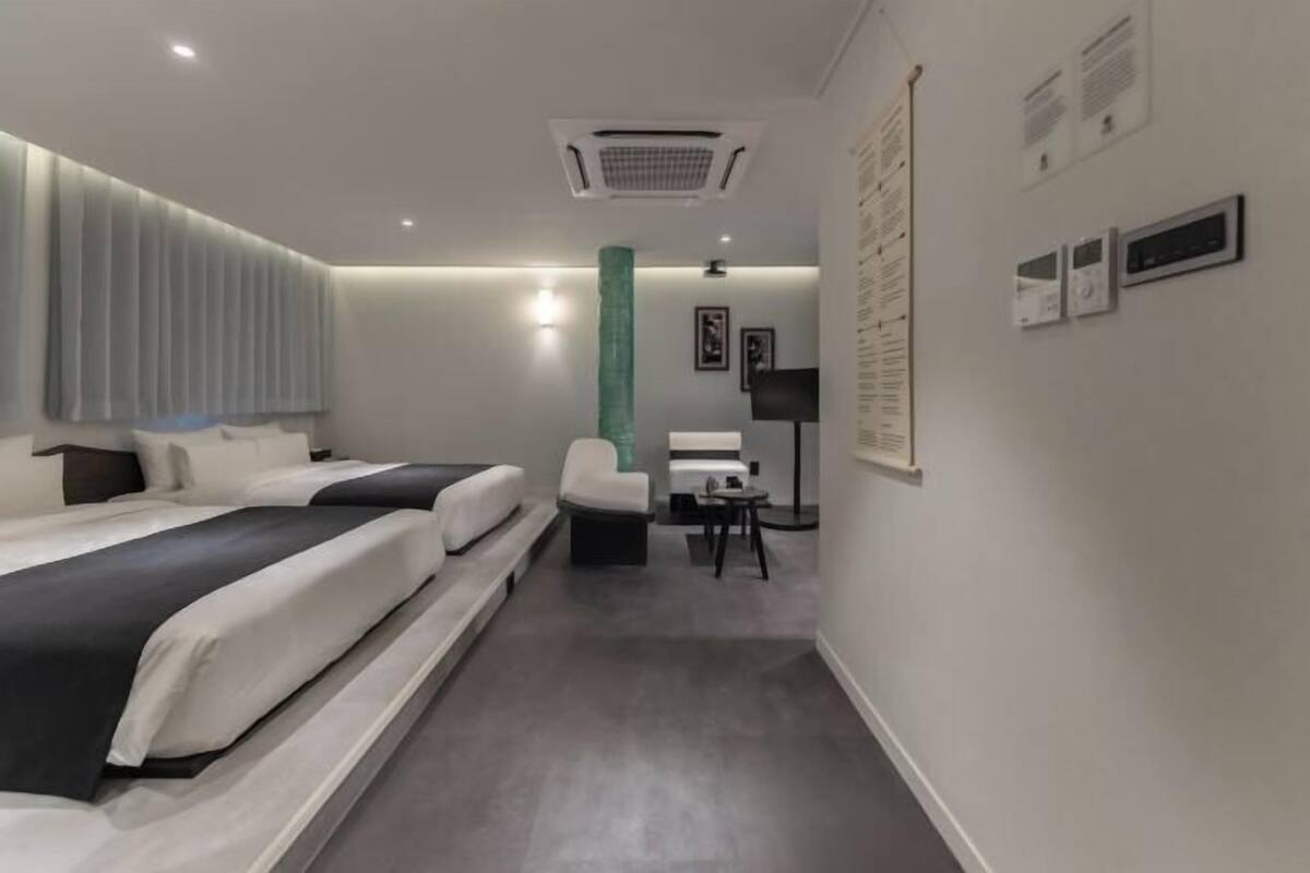 Premium bedding, laptop workspace, free WiFi, bed sheets