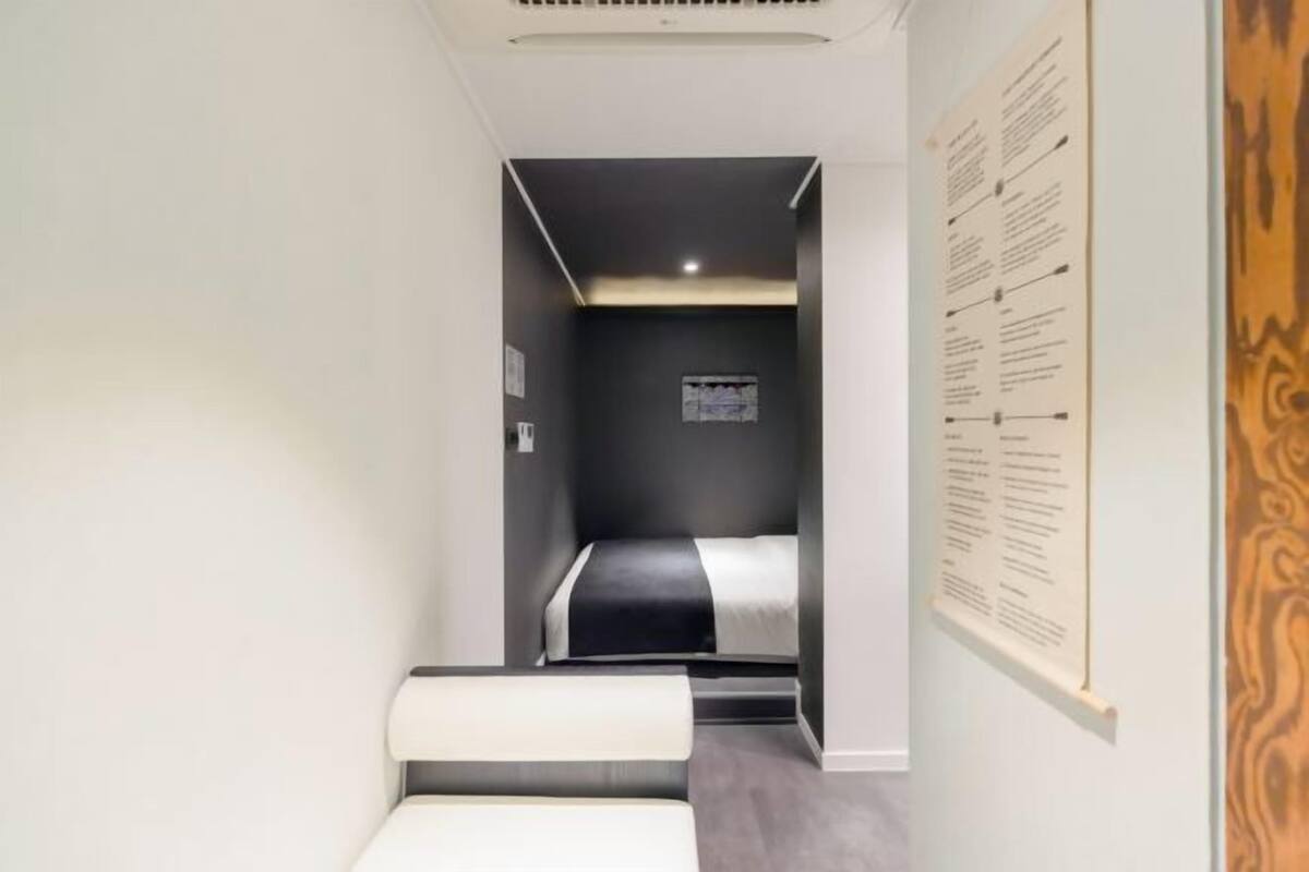 Premium bedding, laptop workspace, free WiFi, bed sheets