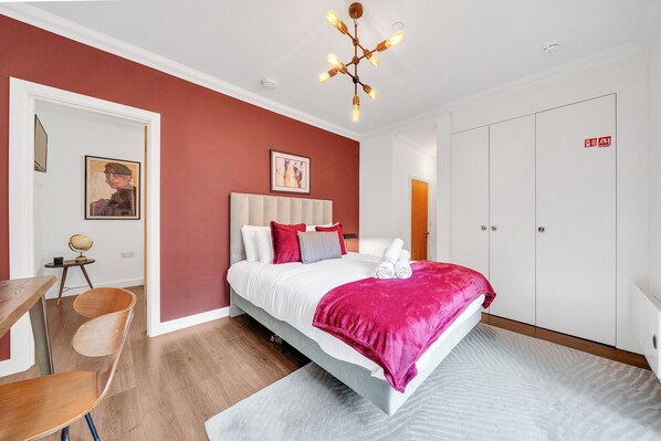 Iron/ironing board, travel crib, free WiFi, bed sheets