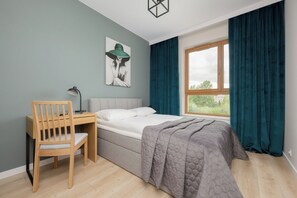 1 dormitorio, tabla de planchar con plancha, cuna de viaje y wifi