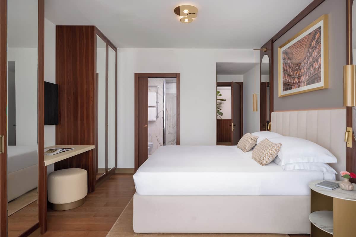 Hypo-allergenic bedding, down duvets, pillow-top beds, in-room safe