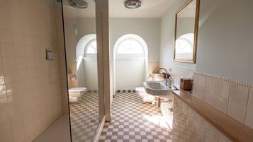 Deluxe Double Room | Bathroom | Shower, hair dryer, bathrobes, slippers