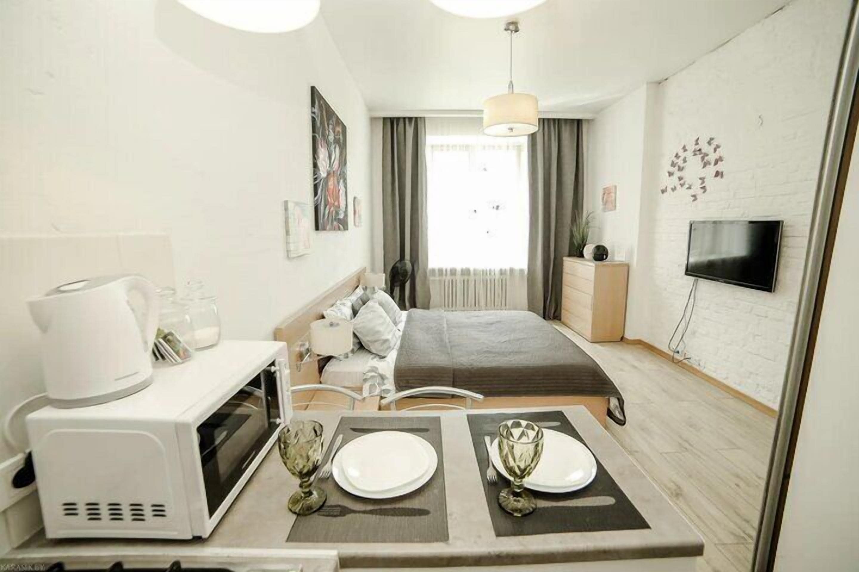 Appartamento Comfort | Area soggiorno | TV a schermo piatto 40 pollici con canali digitali