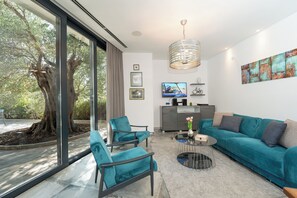 Comfort House, 3 Bedrooms, Poolside | Living area | 58-inch TV with digital channels - Villa Picholine (Novalja)