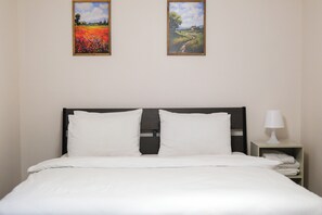 2 habitaciones, tabla de planchar con plancha, wifi y ropa de cama 