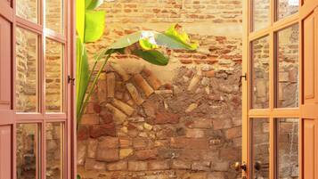 Familie studio, patio | Terras