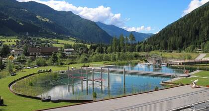 Vacation apartment with private garden and small pond at the foot of the Großglockner!