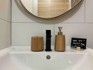 Hair dryer, towels, soap, shampoo