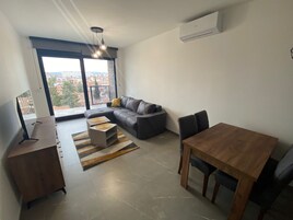Apartment, 2 Bedrooms | Living area | Flat-screen TV