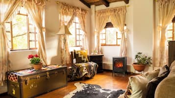 Suite Premium, vista a la montaña | Área de sala de estar