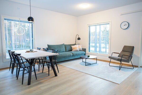 Superior Apartment, 2 Bedrooms, Balcony, Partial Lake View | Living area | Fireplace, heated floors - Vuokatin Välke A10 (Sotkamo)