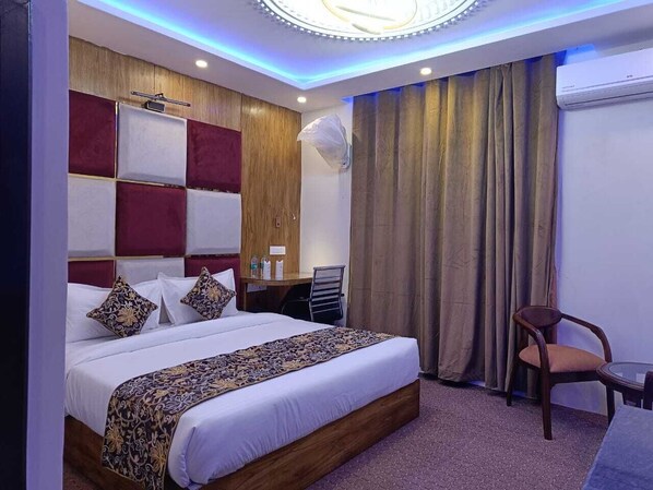 Deluxe Room, City View | Down comforters, minibar, desk, laptop workspace - The Hoften Al Shaykh Resorts, Srinagar (Srinagar)