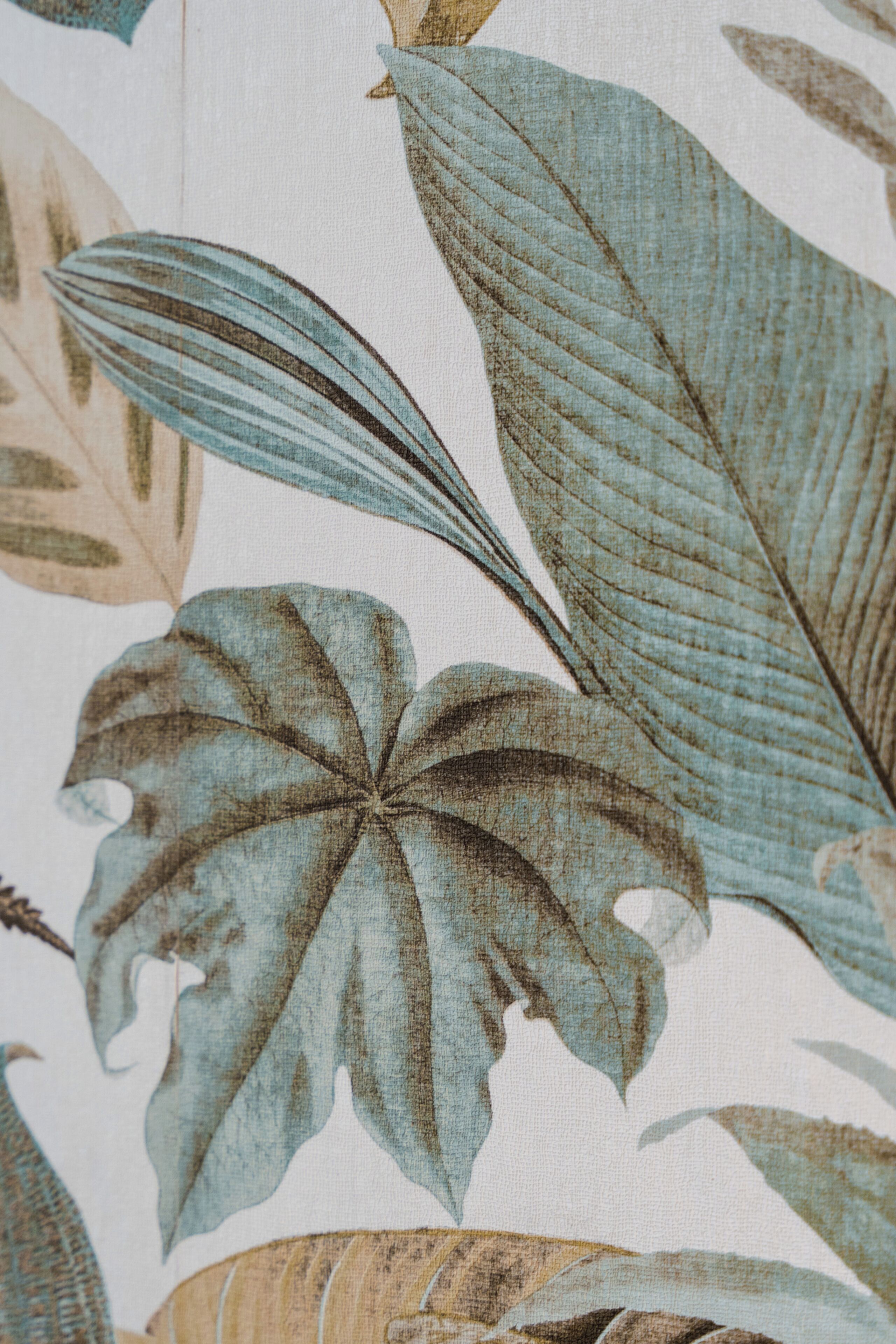 A fabric with a tropical leaf pattern.