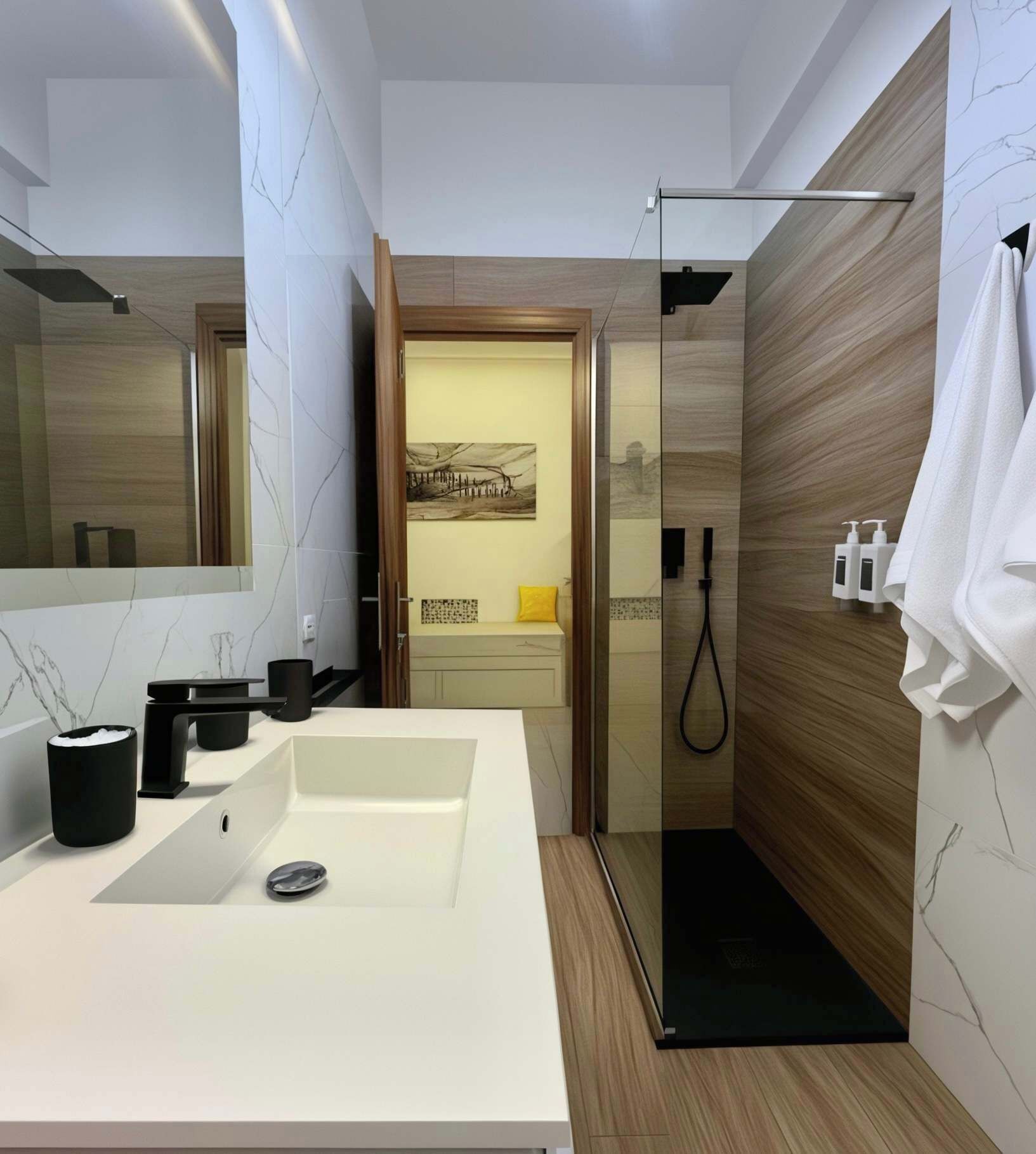 Shower, hair dryer, towels, shampoo