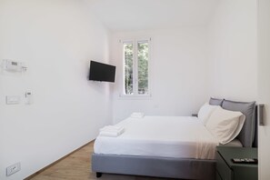 1 slaapkamer, een strijkplank/strijkijzer, wifi, beddengoed