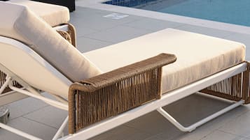 2 outdoor pools, open 7:00 AM to 7:00 PM, pool umbrellas, sun loungers