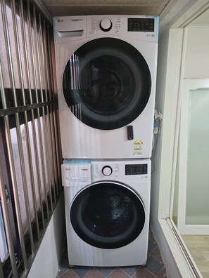 Convenient laundry facilities are available in this room.