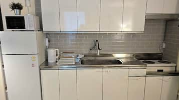 Fridge, microwave, electric kettle, high chair