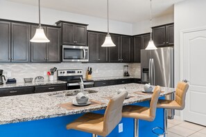 Fridge, microwave, oven, stovetop - Spacious townhome w/ Pvt Pool, Clubhouse access in wonderful Windsor at Westside (Kissimmee)