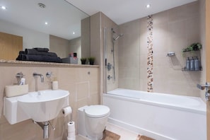Hair dryer, towels, soap, toilet paper